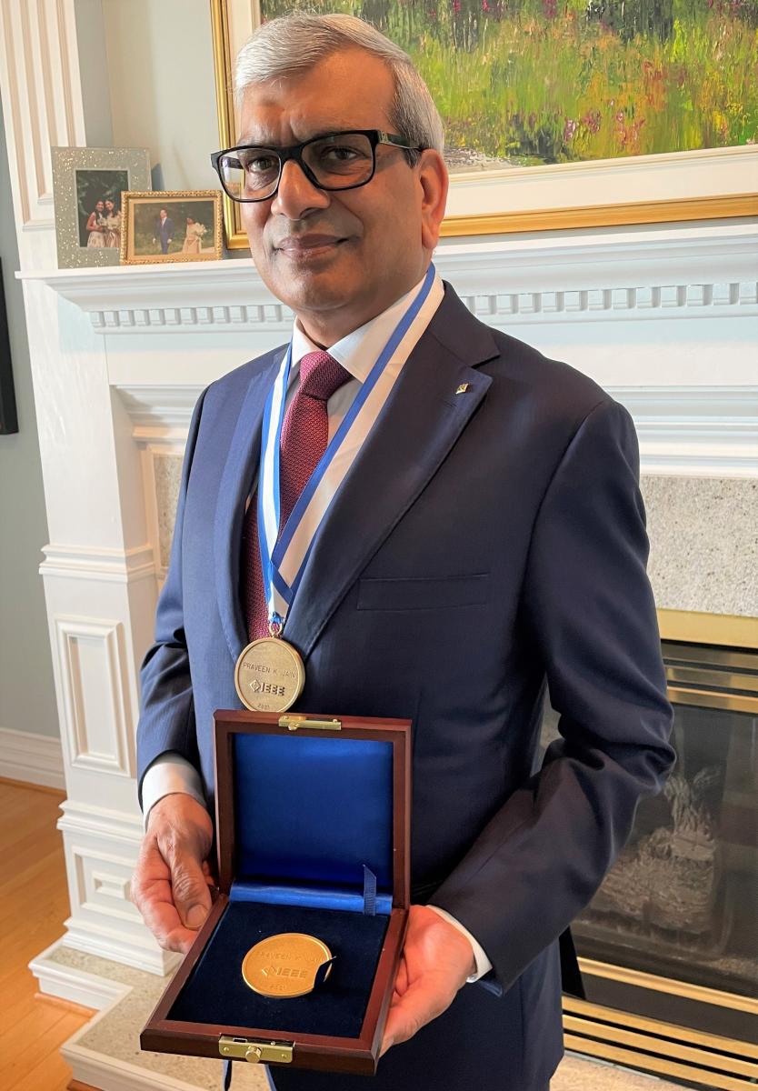 [Photo of Praveen Jain and his IEEE medal]