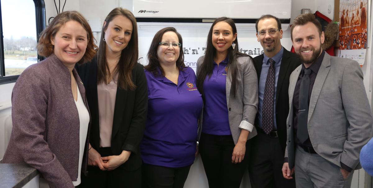 Representatives from Rideau Heights Public School and Queen's Faculty of Engineering and Applied Science celebrate funding which will allow Queen's to continue to visit schools like Rideau Heights and offer science, technology, engineering, and math programming. (University Communications)