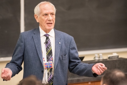 Douglas Cardinal lectures in front of a packed room in Macdonald Hall during his visit to Queen's to receive his honorary degree in March, 2017.