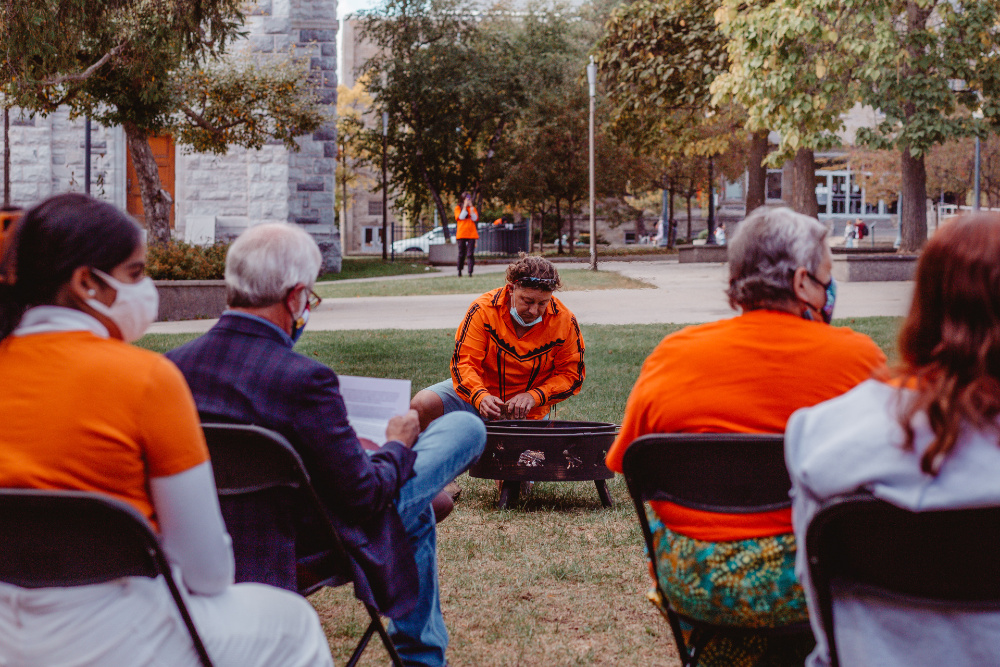 Sacred fire being lit.