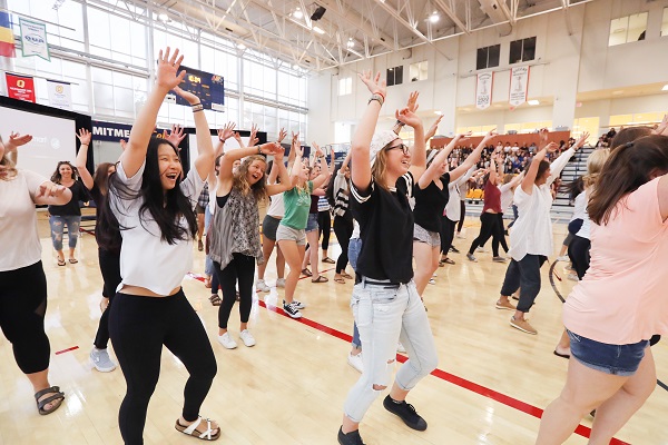 Orientation leaders warm up and prepare to welcome new students to campus for the first time. (Photo by Lars Hagberg)