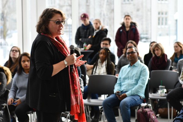Heater Stuart speaks about mental health to an audience in Mitchell Hall