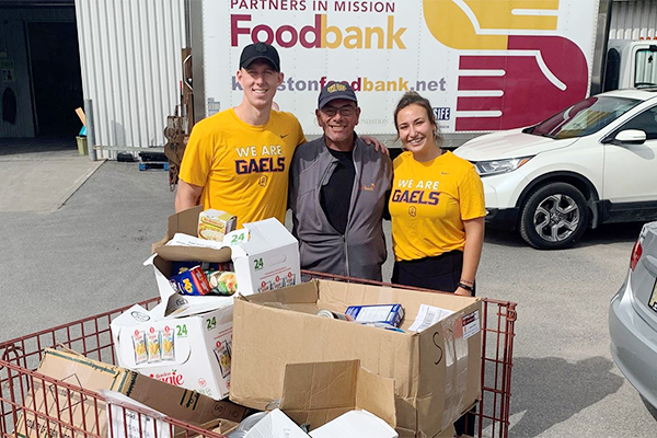 Gaels Varsity Leadership Council donates 795 pounds of food to Kingston’s Partners in Mission Food Bank