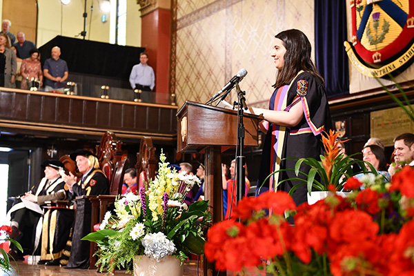 Recotr Alex da Silva addresses graduates during convocation