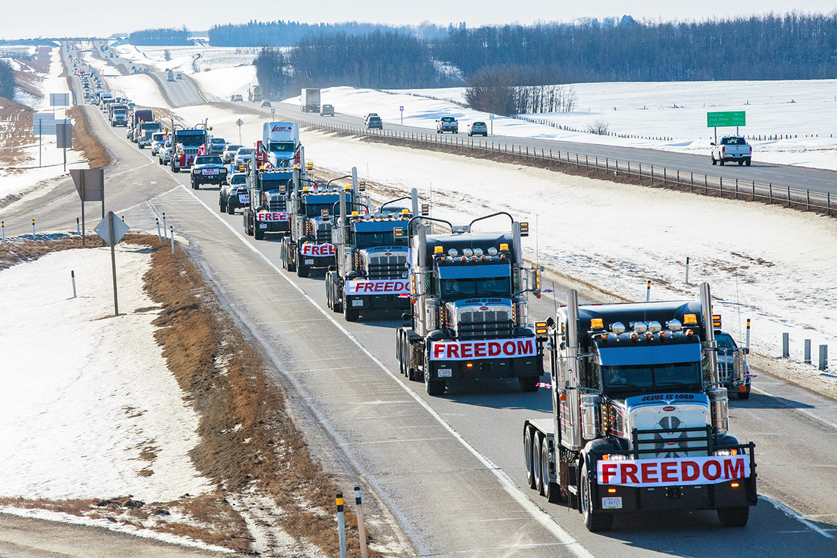 Trucks with Freedom Convoy on their bumpers