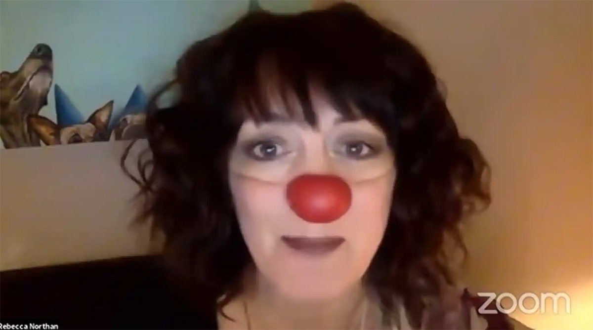 A female actor wears clown-inspired makeup.