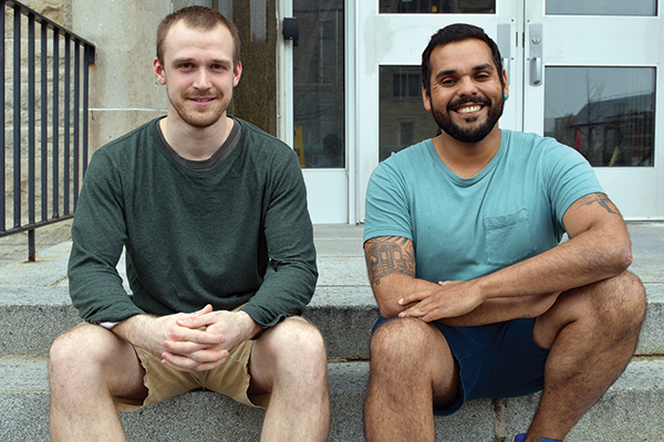 Queen's doctoral candidates Neil Fernandes and Kaj Sullivan are traveling the world meeting with leading workers from industry, academia, and government thanks to the Hugh C. Morris Experiential Learning Fellowship.