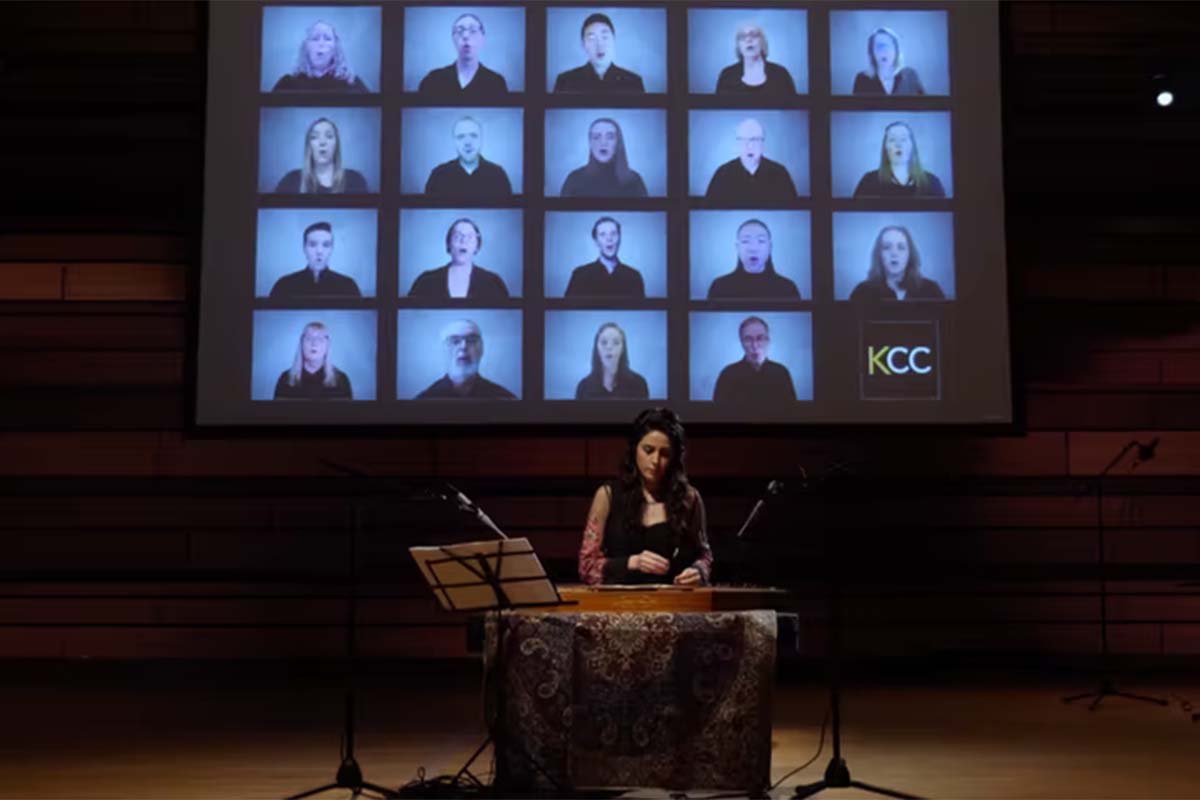 Santur player Sadaf Amini performs in front of singers from the Kingston Chamber Choir. (John Burge)