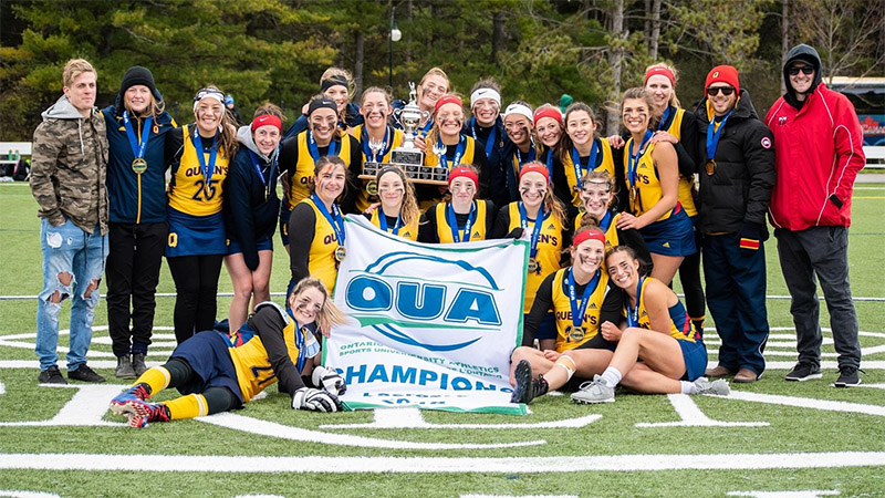 [Gaels women's lacrosse team with OUA banner]