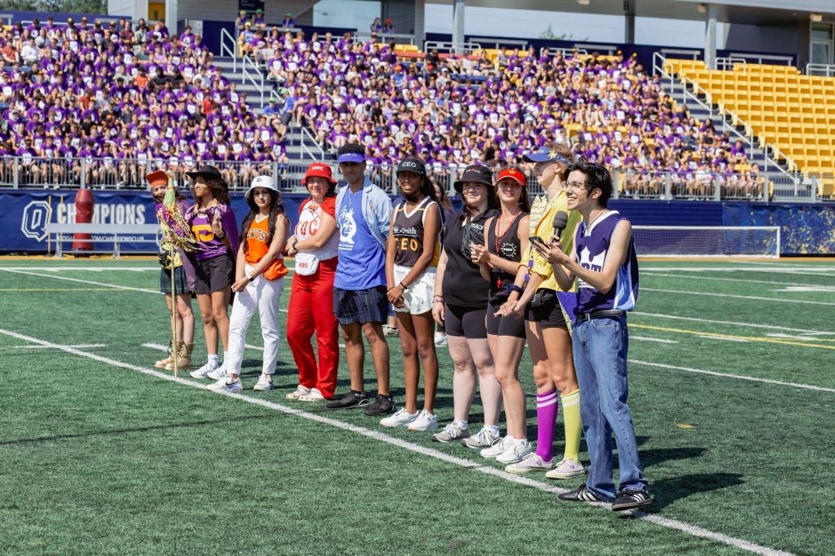 Photograph of student orientation leaders addressing first-year leaders during orientation.