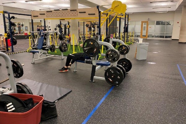 Photograph of people using equipment in the Athletics and Recreation Centre.
