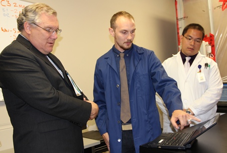 [Jim Dickmeyer with Medizone staff]