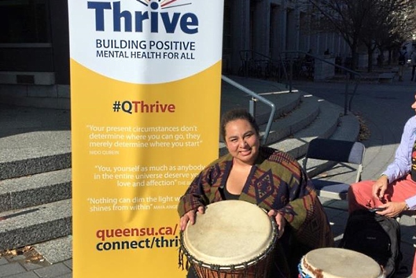 [Yessica Rivera Belsham with her drums]