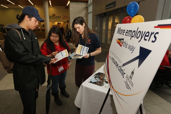 [Students at a job fair hosted by Career Services]