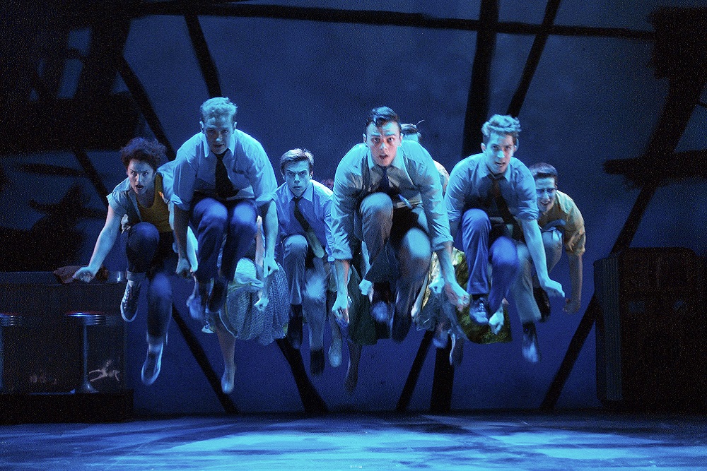 West Side Story actors dance.