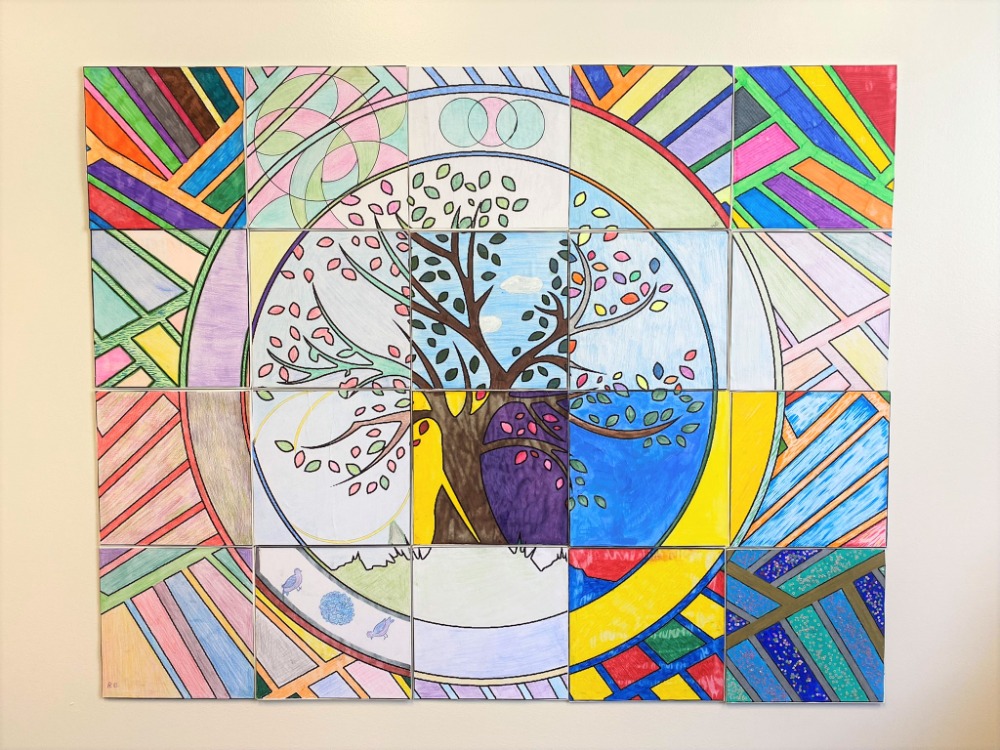 [Photo of a mural of the Oasis logo by Riley Malvern]