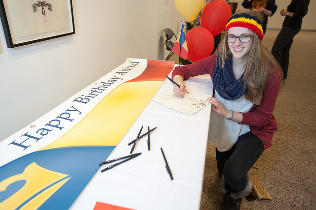Laura Beamish signing a birthday card