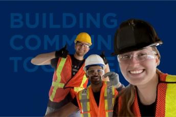 Photograph of Queen's students against a blue background with text behind them reading "Building Community Together"