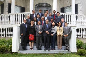 International diplomats and Queen's representatives at the 2019 Ambassador's Forum.
