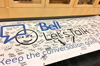 A signed Bell Let's Talk banner with the tagline "Keep the conversation going".