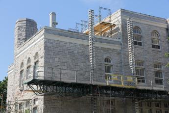 The scaffolding around Fleming Hall will be up until the fall, and back again next summer.