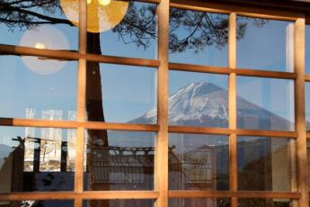 Reflection of Mt. Fuji seen in a Japanese shop window