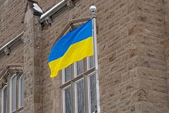 Flag of Ukraine raised on Queen's University Campus.