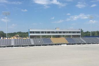 [Construction continues on new press box and west side grandstands]