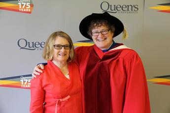 [Honorary degree recipient Debra Pepler (left) with Queen's colleague Wendy Craig]