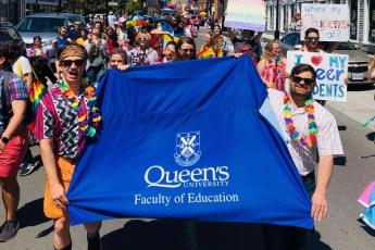 Faculty members of the Faculty of Education take part in the 2019 Kingston Pride Parade.