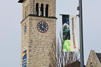 Research banner in front of Grant Hall Tower