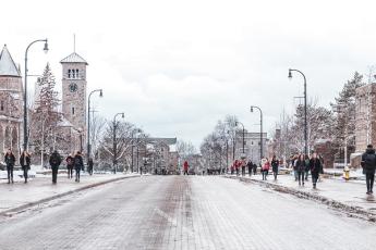 Students walk along University Avenue