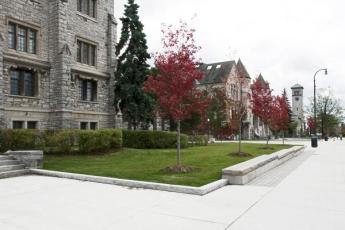 Queen's University campus building on University Avenue, with red fall foliage
