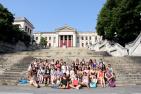 Students sitting on the steps of the University of Havana