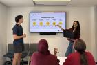 People in a group coaching session.