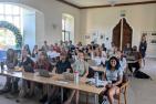 Students sitting in a classroom.