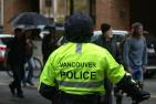 The back of a Vancouver Police Officer.