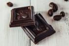 Squares of chocolate and coffee beans.