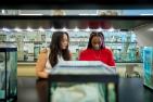 Two student researchers in a lab