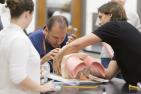 Residents hone their skills in a simulation lab.