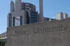 Queen's concrete sign seen in front of Stauffer Library