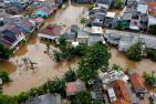 A neighbourhood in Bekasi, Indonesia is inundated as a result of a typhoon. (Adobe Stock) 