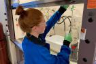 Graduate student samples hand sanitizer
