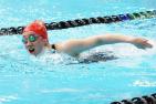 Jessica Tinney swims in a competitive pool.
