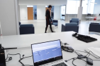 Volunteer walks in the lab while researcher monitors his movement
