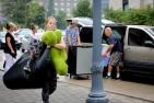 [Stock photo of student moving in to Residences]