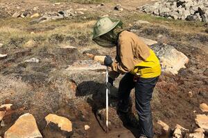 Lee Nguyen collecting samples