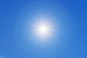 Hot sun in blue sky