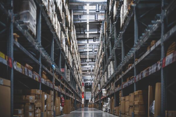 Rows of metal shelves in warehouse