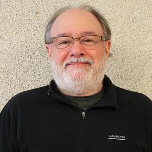 [Photo of Dr. Mark Rosenberg]